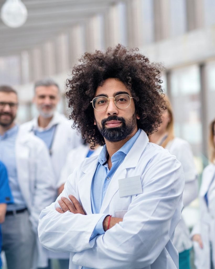 group-of-doctors-standing-in-corridor-on-medical-conference.jpg